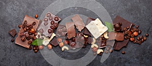 Various chocolate pieces, coffee beans and nuts