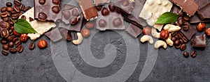 Various chocolate pieces, coffee beans and nuts