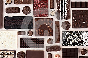 Various chocolates and candies, sweet confectionary collection, dessert background