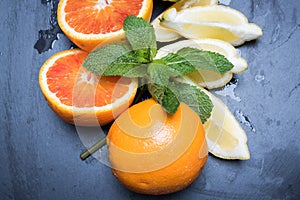 Various citrus fruits and mint