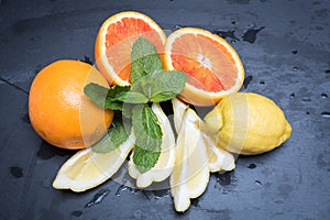 Various citrus fruits and mint