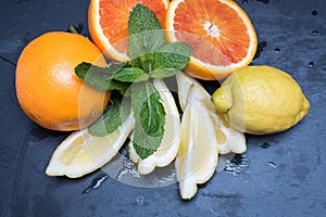 Various citrus fruits and mint
