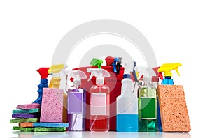 Various cleaning supplies on a white background