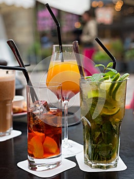 Various cocktails on the table of a bar