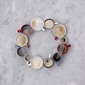 Various coffee in different cups on the concrete gray background