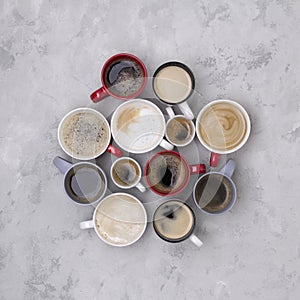 Various coffee in different cups on the concrete gray background