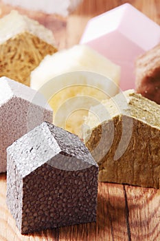 Various Colored House Blocks on Wooden Table