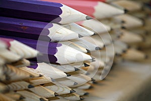 Various colored pencils in row as a creativity selective focus