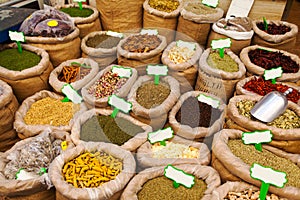 Various colored spices on the Mahane Yehuda Market in Jerusalem.