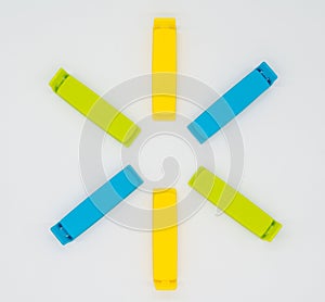 Various colorful bag clips isolated on the white