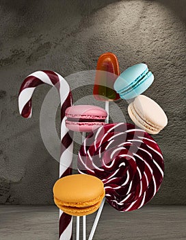 Various colorful candies, lollipops, and macaroons. Sweets on stone background