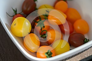 Various colorful cherry tomatoes in a plate 1