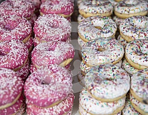 Various colorful doghnut with sugar decoration