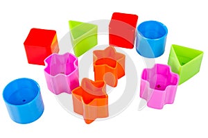 Various coloured blocks for shape sorter toy isolated