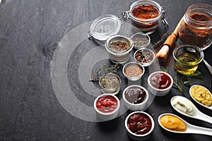 Various Condiments on Table with Copy Space