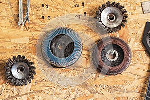 Various construction tools are hanging on the osb board