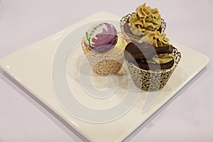 Various cupcakes: vanilla, chocolate