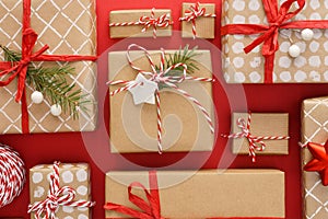Various decorated gift boxes on red background