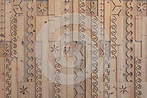 various decorative milled patterns in pine wood photo