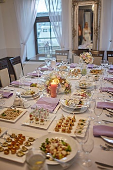 Various delicious snacks to the buffet table