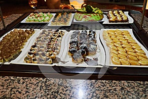 Various desserts in candy bar food buffet during hotel brunch