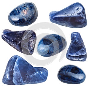 Various dumortierite gem stones isolated on white photo