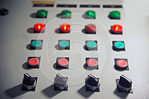 Various electrical controls on the wall.