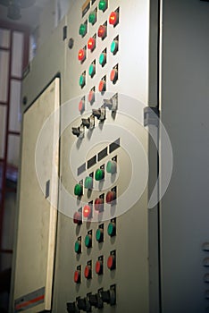 Various electrical controls on the wall.