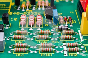 Various electronic components on detail of printed circuit board. Electrotechnics