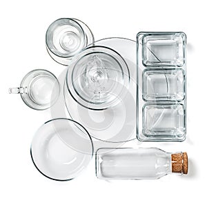 Various empty glassware on a clean white background.