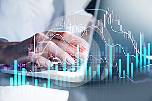 Various financial charts showing increase of price in stock market, digitalization and internet trading concept, close up of