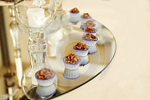 Various fine chocolates pralines on plate, dark and milk chocolate. Wedding concept