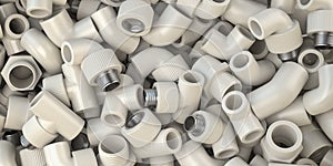 Various fittings of pvc plastic pipes and tubes in heap. Plumbing ackground