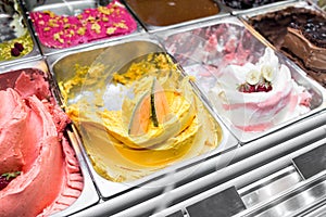 Various flavors of gelato in italy. Creamy Italian ice cream in shop window