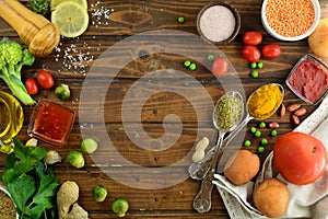 Various foods, fresh herbs and spices on wooden background - cover photo