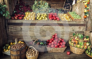 Various fresh fruits in the wicker baskets and crates, fruit mar