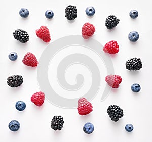 Various fresh summer berries frame