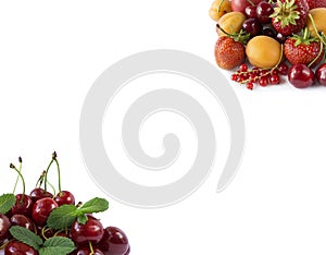 Various fresh summer berries. Ripe strawberries, redcurrants, apricots, nectarines and cherries on white background.