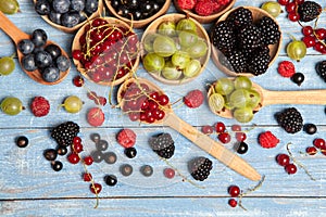 Various fresh summer berries. Top view. Berries mix fruit color food dessert Berries.Antioxidants, detox diet, organic fruits.