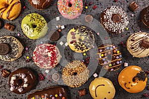 Various glazed doughnuts with sprinkles