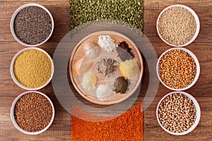 Various grains and their flour - top view