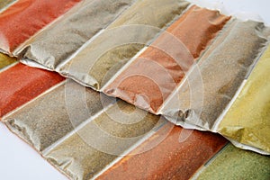 Various ground spices packets