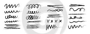 Various hand drawn line patterns and scribbles on a white background
