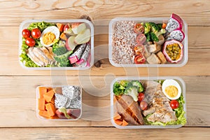 Various of Healthy lunch boxes in plastic package, clean food, top view. Diet food concept