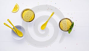 Various of ice cream flavor lemon and orange set up on white wooden background .