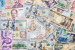 Various international foreign currency banknotes background. International trade, money cross border concept