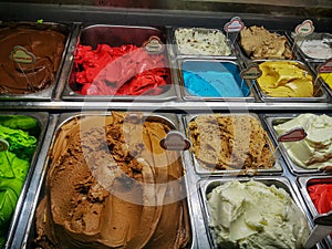 Various italian gelato ice cream flavours in modern shop display