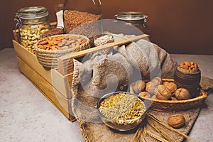 Various jars of nuts and cereals. Sources of protein and trace elements.