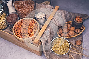 Various jars of nuts and cereals. Sources of protein and trace elements.