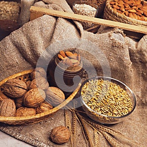 Various jars of nuts and cereals. Sources of protein and trace elements.